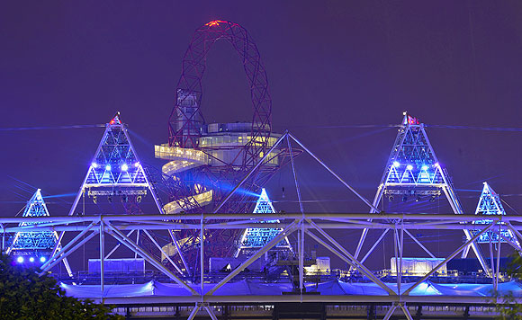 A light display is seen at the Olympic Stadium after a full dress rehearsal in London on Wednesday