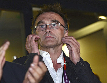 Danny Boyle, the director of the London Olympic Games opening ceremony watches the ceremony at the Olympic Stadium on Friday