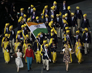 The Indian contingent at the Games Opening with the mystery woman