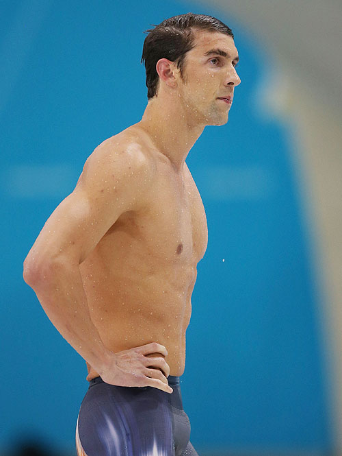 Michael Phelps of the United States reacts after he finished fourth in the final of the Men's 400m Individual Medley
