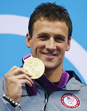 Ryan Lochte of the U.S. holds his gold medal for the men's 400m individual medley during the London 2012 Olympic Games at the Aquatics Centre on Sunday