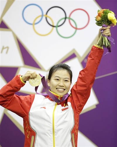 China's Yi Siling celebrates after winning the gold medal