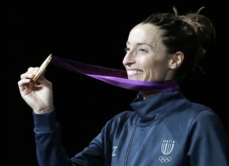Italy's gold medalist Elisa Di Francisca shows off her medal