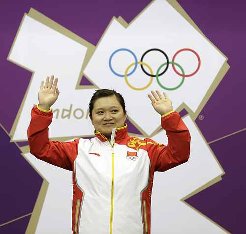 China's Guo Wenjun celebrates after winning the gold medal in the women's 10-meter air pistol event