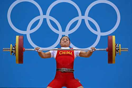 China's Xueying Li lifts 108 Kg on snatch setting new Olympic record on the women's 58Kg Group A weightlifting competition