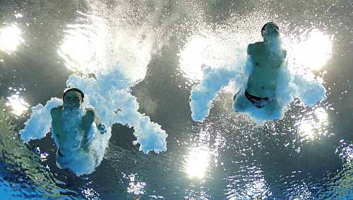 Yuan Cao and Yanquan Zhang of China compete in the Men's Synchronised 10m Platform Diving