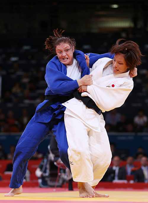 Kaori Matsumoto of Japan competes against Corina Caprioriu of Romania in the Women's -57 kg Judo