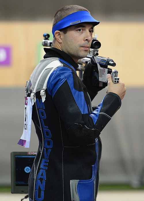 Alin George Moldoveanu of Romania competes in the Men's 10m Air Rifle Shooting final