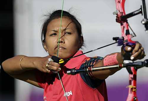 India's Bombayla Devi Laishram shoots during an elimination round of the individual archery competition