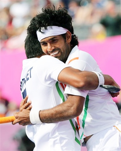 India's Shivendra Singh celebrates his goal