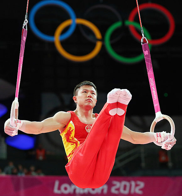 Chen Yibing of China competes on the rings in the Artistic Gymnastics Men's Team final on Monday
