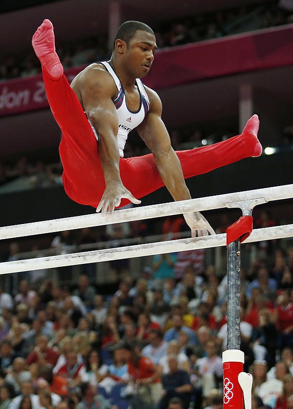 US gymnast John Orozco performs on the parallel bars during the Artistic Gymnastic men's team final on Monday