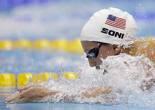 United States' Rebecca Soni competes in the women's 100-meter breaststroke swimming