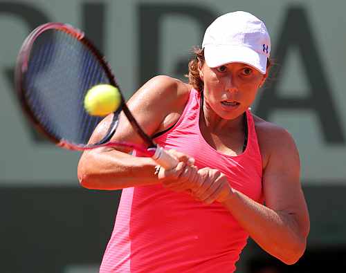Varvara Lepchenko of the U.S. returns the ball to Francesca Schiavone of Italy during the French Open