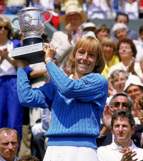 Martina Navratilova hold up her trophy after winning the French Open