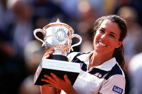 Jennifer Capriati celebrates with the trophy after winning the womens final match against Kim Clijsters of Belgium in 2001