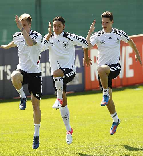 Germany's Marco Reus (left), Mesut Oezil and Julian Draxler (right) during a training session in Tourrettes