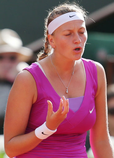 Petra Kvitova of the Czech Republic reacts during her women's semi-final match against Maria Sharapova of Russia at the French Open