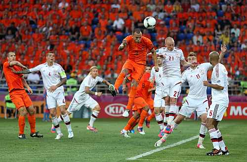 Wesley Sneijder of Netherlands heads the ball during the UEFA EURO 2012 group B match between Netherlands and Denmark