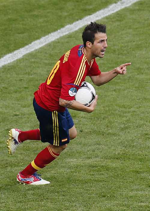 Spain's Cesc Fabregas celebrates after scoring against Italy during their Group C Euro 2012 soccer match at the PGE Arena stadium