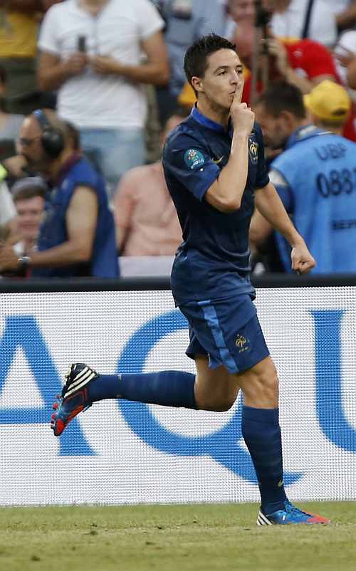 France's Samir Nasri gestures as he celebrates after scoring against England during their Group D Euro 2012 soccer match at the Donbass Arena in Donetsk