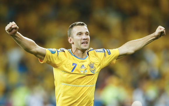 Ukraine's Andriy Shevchenko celebrates after winning their Group D Euro 2012 soccer match against Sweden at the Olympic stadium in Kiev