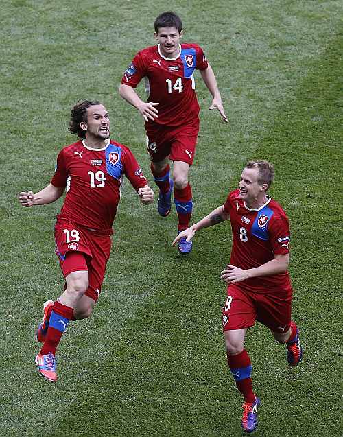 Czech Republic's Petr Jiracek (L) celebrates with his teammates David Limbersky (R) and Vaclav Pilar after scoring against Greece during their Group A Euro 2012 soccer match at the City stadium in Wroclaw