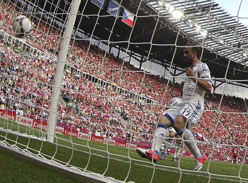 Greece's Fanis Gekas scores a goal during their Group A Euro 2012 soccer match against Czech Republic at the City stadium in Wroclaw