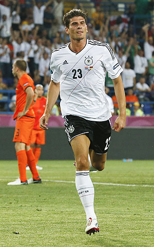 Germany's Mario Gomez celebrates after he scored a goal against Netherlands
