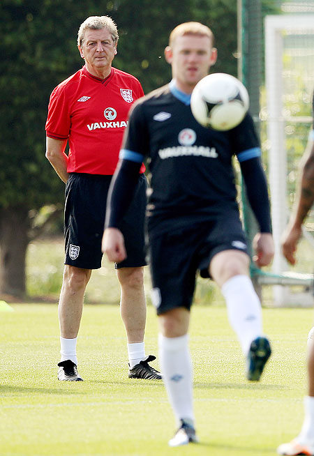England manager Roy Hodgson looks on at Wayne Rooney