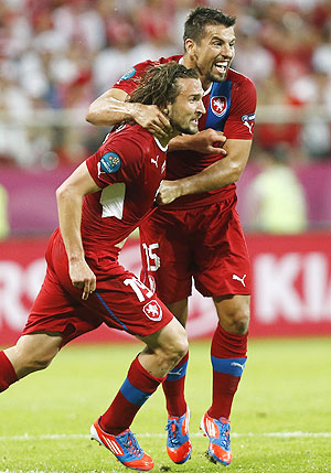 Scorer Czech Republic's Petr Jiracek (left) celebrates with teammate Milan Baros after scoring against Poland on Saturday