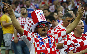 A fan of Croatia cheers