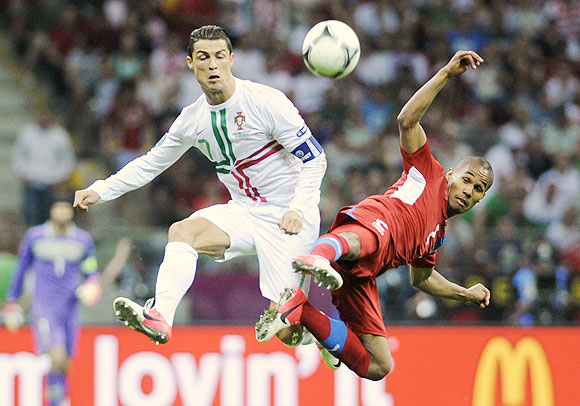 Portugal's Cristiano Ronaldo (right) and Czech Republic's Theodor Gebre Selassie fight for the ball