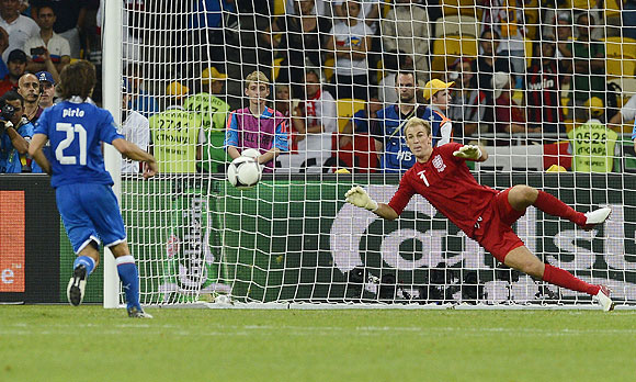 Italy's Andrea Pirlo scores past England's goalkeeper Joe Hart during the penalty shoot-out