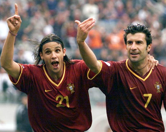 Portugal's Nuno Gomes (left) with Luis Figo