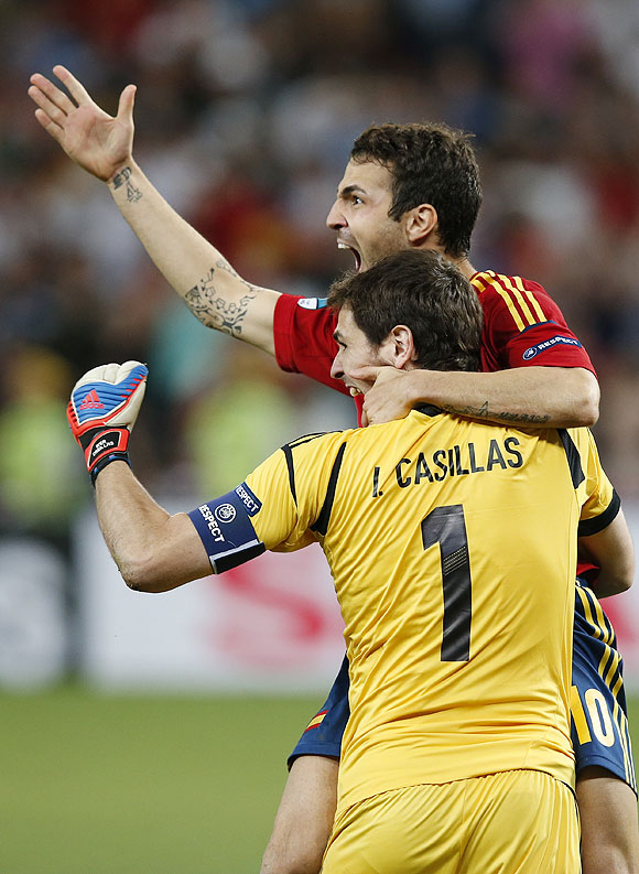 Fabregas celebrated with Iker Casillas