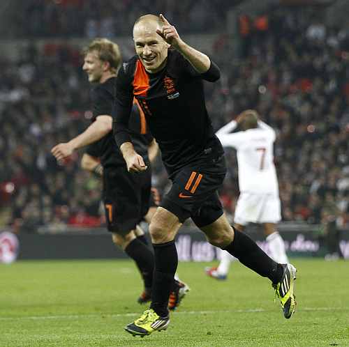 Arjen Robben celebrates after scoring the winning goal against England during an international friendly match at Wembley Stadium