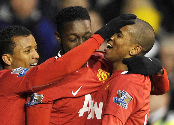 Manchester United's Ashley Young (right) celebrates with teammates after scoring against Tottenham Hotspur on Sunday