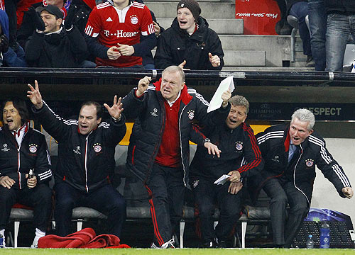 Munich's manager Nerlinger and coach Heynckes celebrate