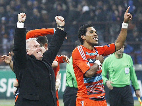 Olympique Marseille's coach Deschamps celebrates next to Brandao at end of their Champions League soccer match against Inter Milan at Giuseppe Meazza stadium
