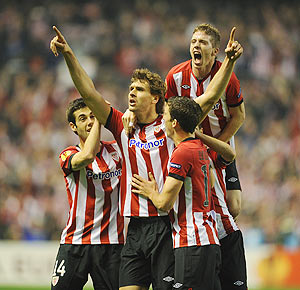 Fernando Llorente of Bilbao celebrates with teammates after scoring against Manchester United during their UEFA Europa League Round of 16 second leg match on Thursday
