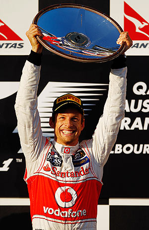 McLaren's Jenson Button celebrates on the podium after winning the Australian Formula One Grand Prix on Sunday