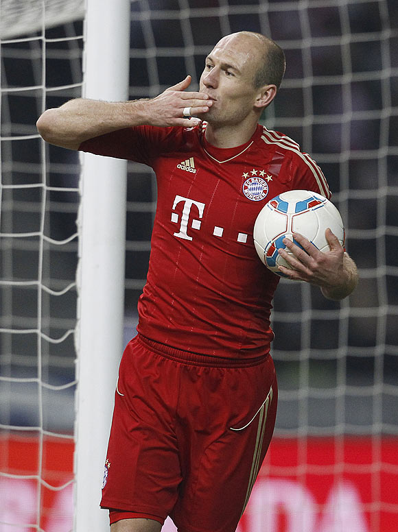 Bayern Munich's Arjen Robben celebrates after scoring against Hertha Berlin on Saturday