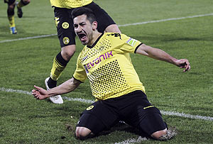 Borussia Dortmund's Ilkay Guendogan celebrates after scoring against Greuther Fuerth during their German semi-final in Fuerth on Tuesday