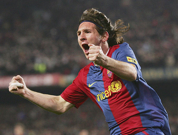 Lionel Messi celebrates after scoring against Real Madrid in 2007