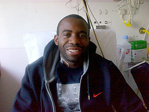 Bolton Wanderers footballer Fabrice Muamba poses for a photograph in the London Chest Hospital in east London March 30, 2012. The photograph, was released by members of Muamba's family on Twitter on Friday
