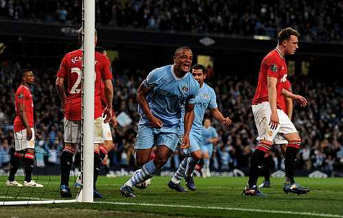 Mamchester City's Vincent Kompany celebrates after scoring during the Premier League match at the Etihad Stadium