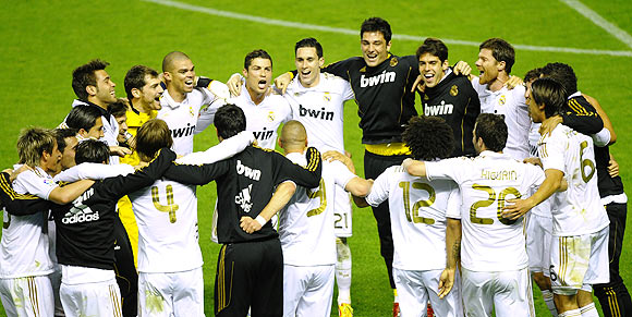 Real Madrid players celebrate after their 3-0 win over Athletic Bilbao and claiming the La Liga title
