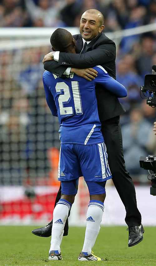 Chelsea's coach Di Matteo celebrates with Kalou after their FA Cup final soccer match against Liverpool at Wembley Stadium in London