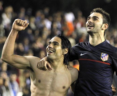 Atletico Madrid strikers Radamel Falcao (left) and Adrian Lopez